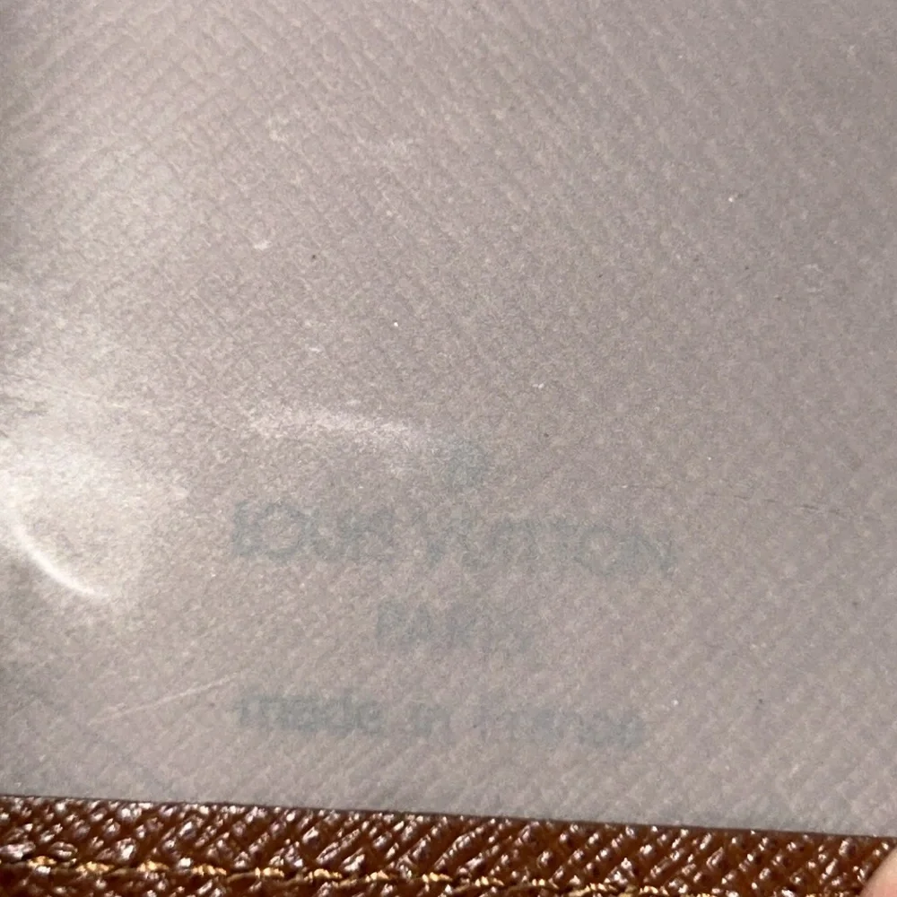 Authentic Louis Vuitton Taiga Leather ID / Card Holder